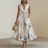 Chic White Dress with Blue Floral Accents for Celebrations
