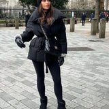 Black Belted Puffer Jacket with High Collar and Side Pockets