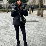 Black Belted Puffer Jacket with High Collar and Side Pockets